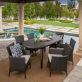 7 Piece Wicker Oval Dining Set with Cushions Z48412